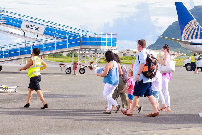 Fast Track (Expedited Arrival) & FREE Transfer To Hotel/Airbnb - Handing off to your private St. Lucia driver