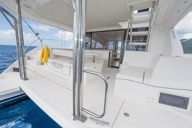 Private Half-Day Luxury Catamaran Experience - Swimming and snorkeling at a beautiful beach