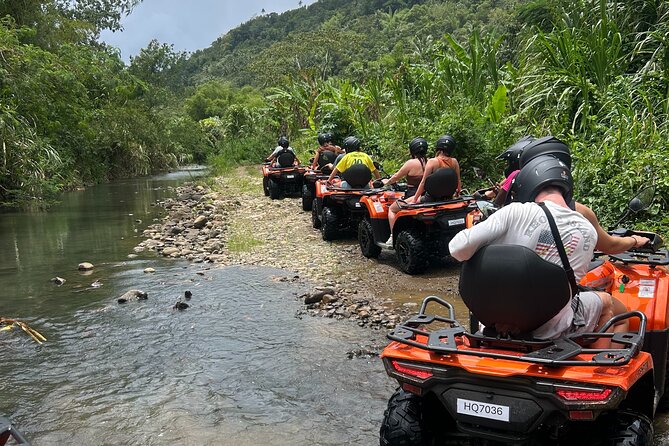 St Lucia ATV Tour : Waterfall, Plantation, Beach and Distillery - Riding through banana country with Farmer Peter