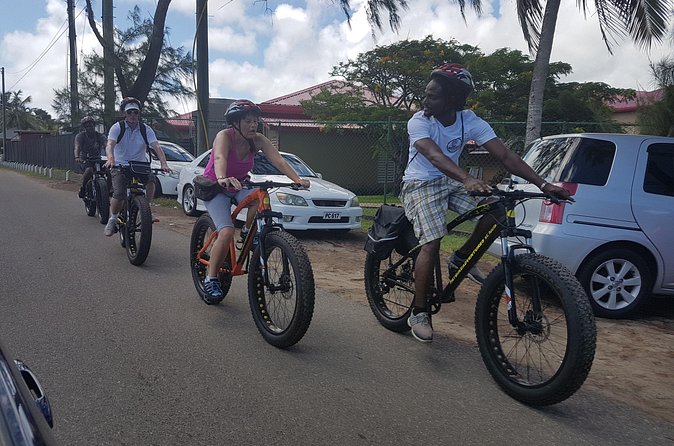 St Lucia Coastal Bike Tour to Pigeon Island - Riding the causeway toward Pigeon Island