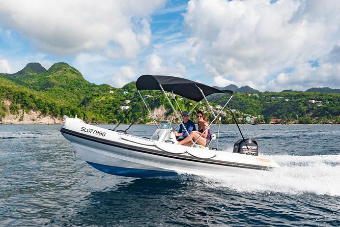 St. Lucia Speedboat and Power Snorkel From Castries - Piloting a 17-foot boat along the coast