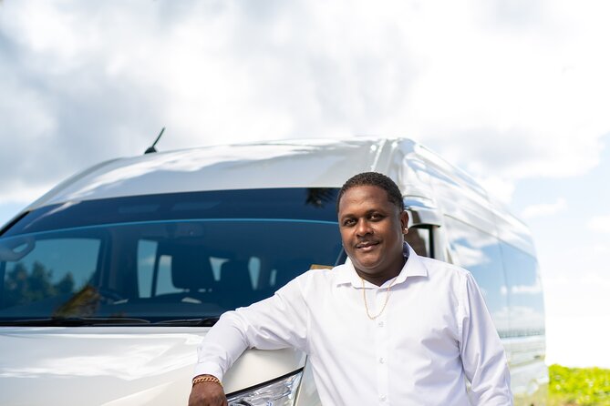 UVF Private Luxury Transport Service in St Lucia (Round Trip) - Meeting your agent with a name board